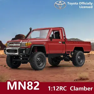 The Mangniu MN82 off-road climbing car, Remote control crawler, featuring four-wheel drive and high horsepower, Toyota pickup RC car model recommended for ages 8 and up, comes with 500mAh lithium battery and remote control handle