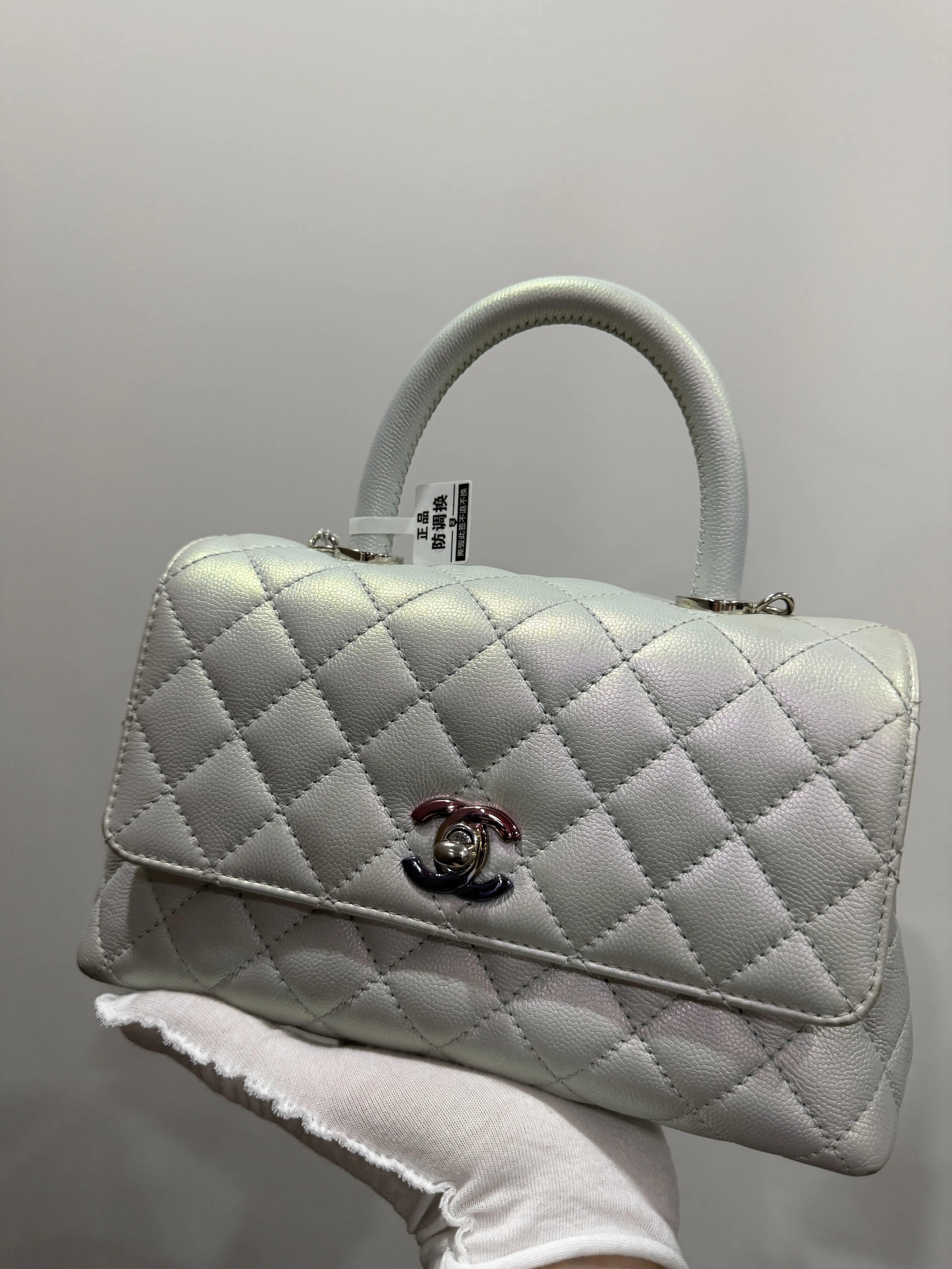 Pre-owned CHANEL Iridescent Quilted Mini Coco Handle Shoulder Bag White Caviar Leather (Calfskin and Cowhide), Palladium Hardware, After 2021
