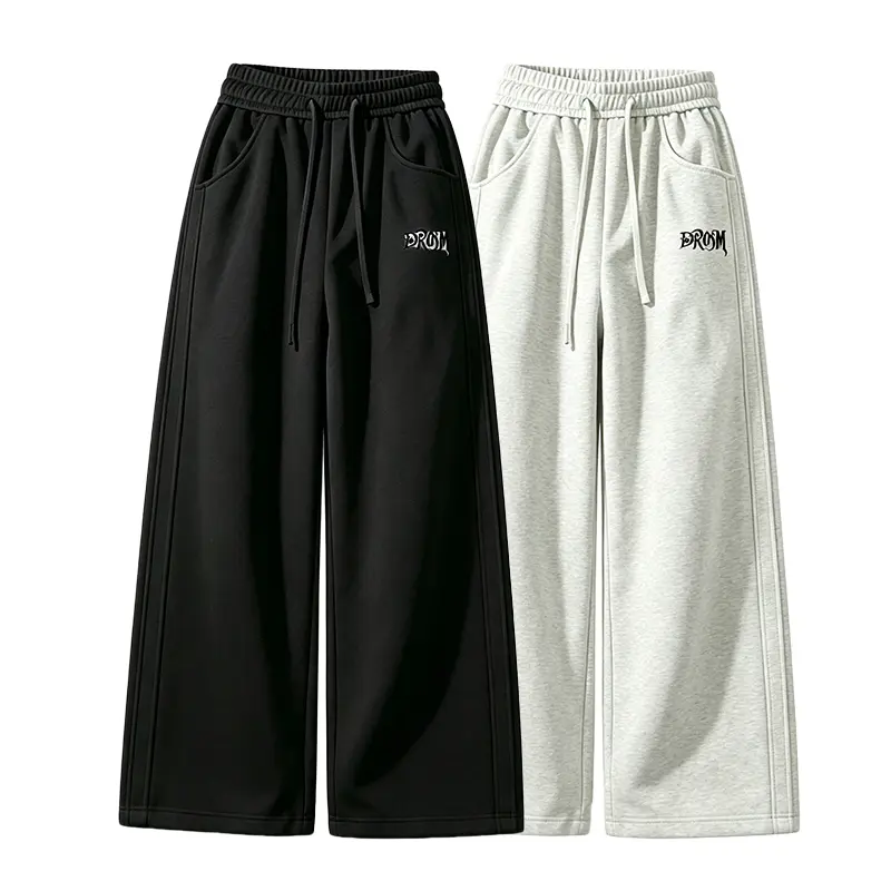 Men’s casual knit pants in a solid color, street-style loose fit with a relaxed drape and soft cream-like fabric—an essential wardrobe piece for all seasons.