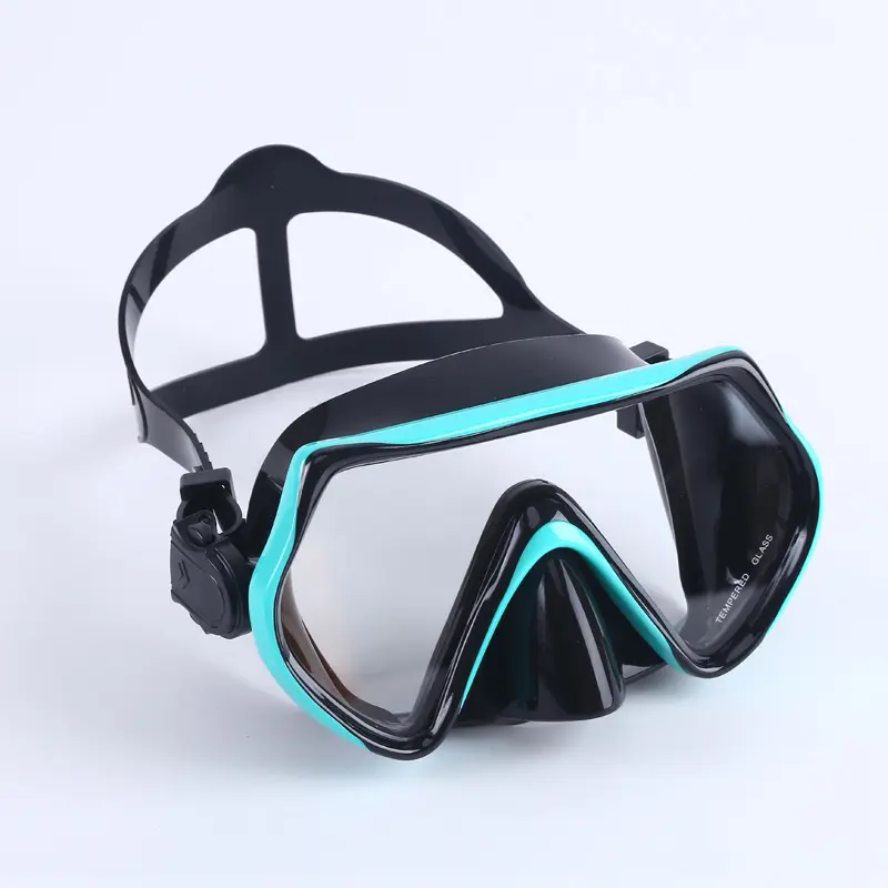 Black and green diving goggles