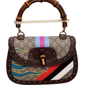 Pre-owned GUCCI canvas Crossbody Bags Bamboo 1947 Top Handle Bag, specifically part of the brand's "Centum" Centennial Collection