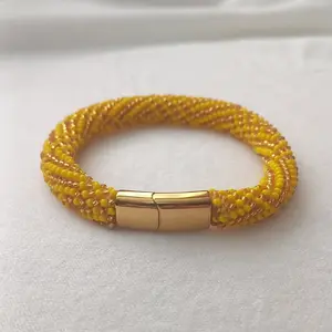 Ilde de Oshun con cierre magnetico de acero inoxidable