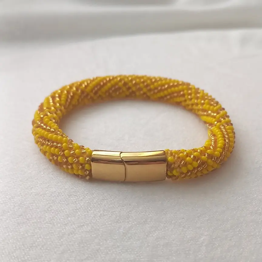 Ilde de Oshun con cierre magnetico de acero inoxidable