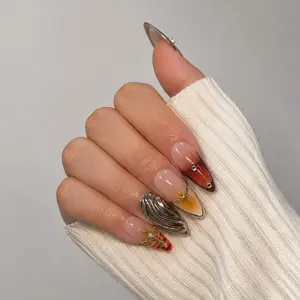 Press'd & Twinkle: "Believe" Press-On Nails — Nude Amber Ombré Stiletto Press-On Nails with 3D Gold Cross & Crystal Charms