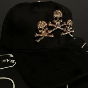 F.e.s el Barbas Lonche Black Velvet Cap with Rhinestone Skull and Crossbones Embellishment