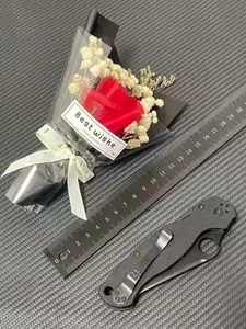 SP C81 Outdoor Multi-Tool, featuring D2 steel and a G10 handle—an outdoor tool designed for camping and hunting—a portable pocket tool