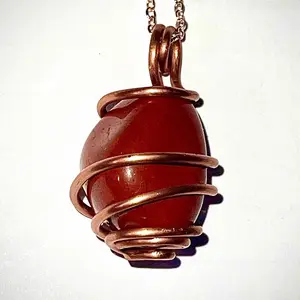 Red Jasper Crystal Pendant wrapped in pure copper wire, on rose gold plated copper necklace.