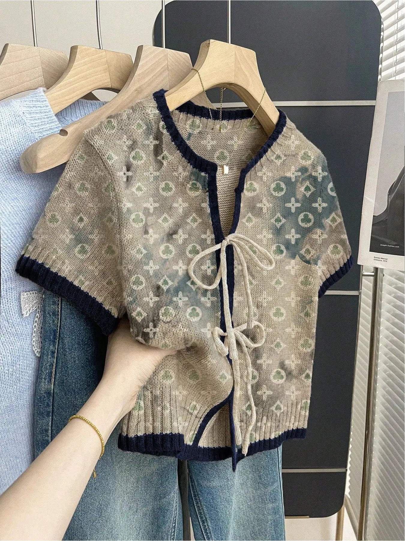Women's khaki bohemian vacation short-sleeve knit top. Loose round neck, contrast geometric print, front tie and contrast piping. Comfortable and stylish for spring & summer casual wear. Blouse Shirt Top