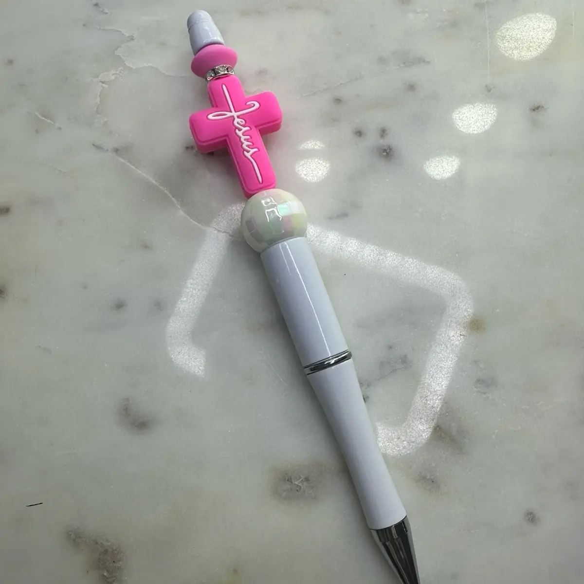 Pink cross pen