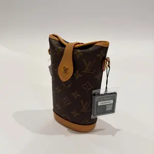 Pre-owned Louis Vuitton Monogram Coated Canvas with Leather Trim Crossbody Bags Brown Monogram Coated Canvas Fold Me Pouch Gold Hardware
