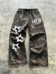 Unisex street style, Casual streetwear pants, leopard print pants with a relaxed fit, drawstring waistband, comfortable and casual design. Perfect for casual daily wear, stylish leopard prints suitable for hip-hop, campus, commuting