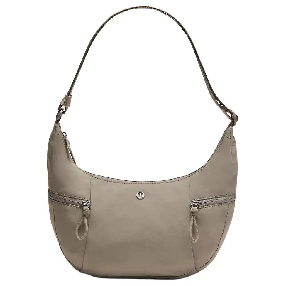 Lululemon 6L Logo Recycled Nylon Crossbody Bag for Men and Women in Warm  Gray - TikTok Shop