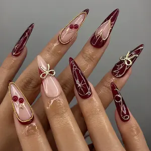 Burgundy Cherry Sweet Cool Press On Nails, 3D Gold Bow with Metal Line Frame, Hollow Heart & Starburst Gold Bead Long Almond Removable False Nails, Nail Art Design, Perfect for Date, Party, Christmas & New Year, with Jelly Glue and Nail File
