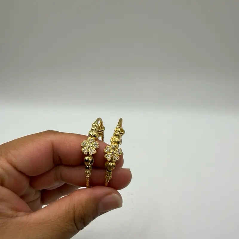 Adjustable gold plated bangles