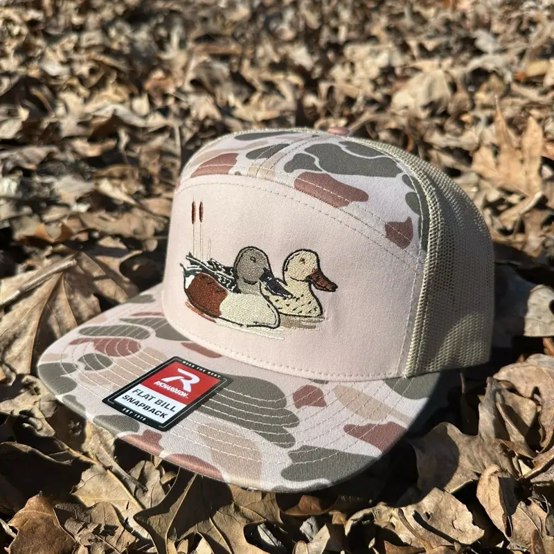 The Shoveler Camo Trucker Hat with Duck Embroidery Flat Bill Snapback for Outdoor Enthusiasts Camouflage Design Richardson 256, 112, and 168 options