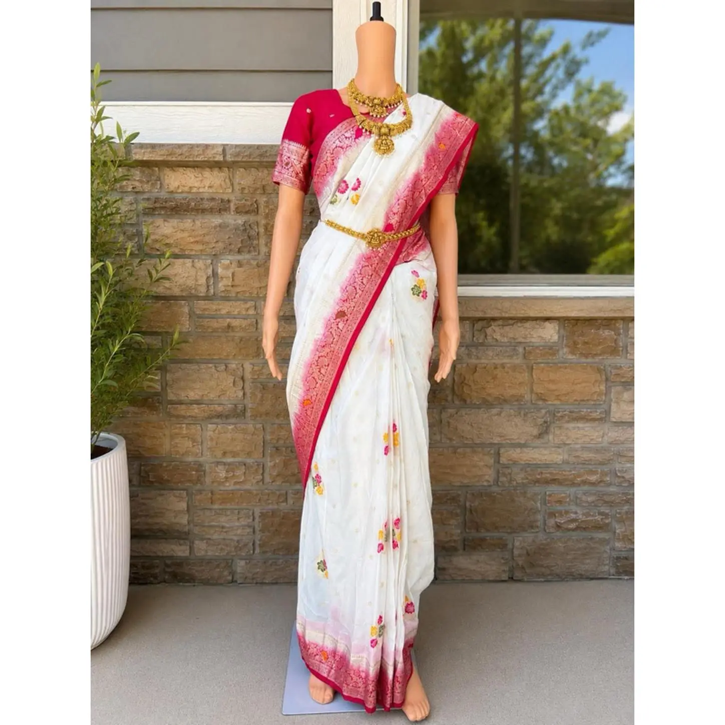 Dola Silk White Saree with Multicolor Floral Embroidery and Pink Woven Border
