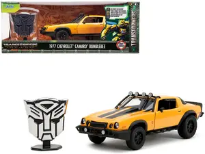 1977 Chevrolet Camaro Off-Road Version Yellow Met. w/Black Stripes & Statue "Transformers" (2023) 1/24 Diecast Model Car by Jada