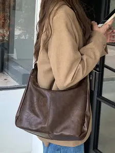 Simple and classic texture brown shoulder handbag, retro fashion casual versatile handbag, niche design commuter shoulder bag, versatile and suitable for office workers, daily travel, shopping and dating, etc. Pu Tote Satchel