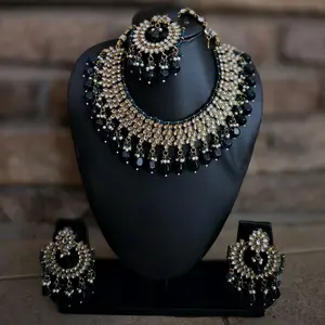 Kundan Necklace, Earrings and Tika set
