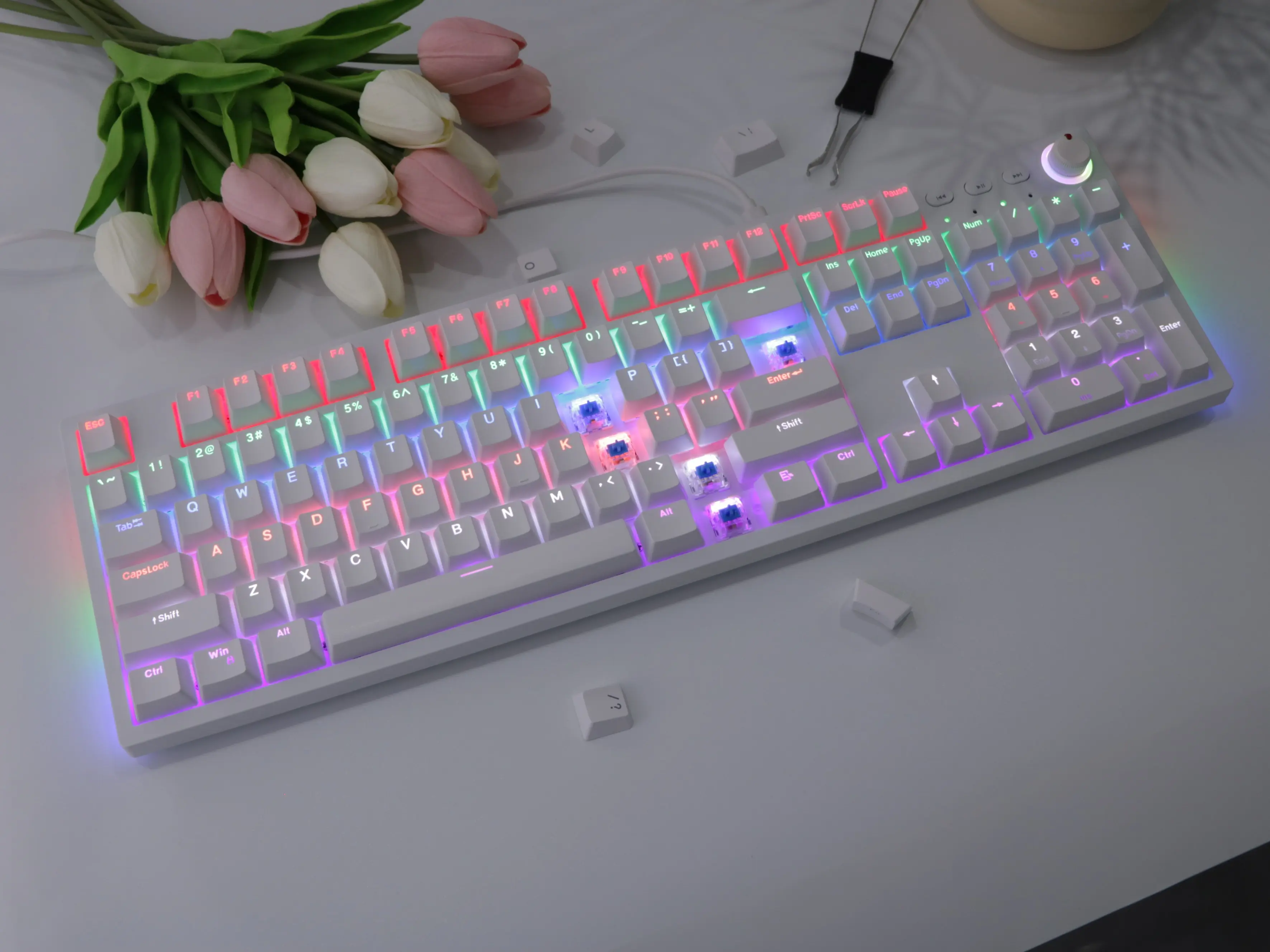 104-key hot-swappable mechanical keyboard (white, USB wired) featuring rainbow LED backlighting, floating keys, and an ergonomic layout; compatible with various operating systems including Windows 10, 8, 7, XP, Vista, and macOS.