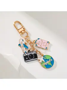 1pc Travel-themed keychains - Containing aircraft, camera, Earth and luggage accessories, stylish enameled metal keychains are perfect for decorating and the perfect gift for travelers