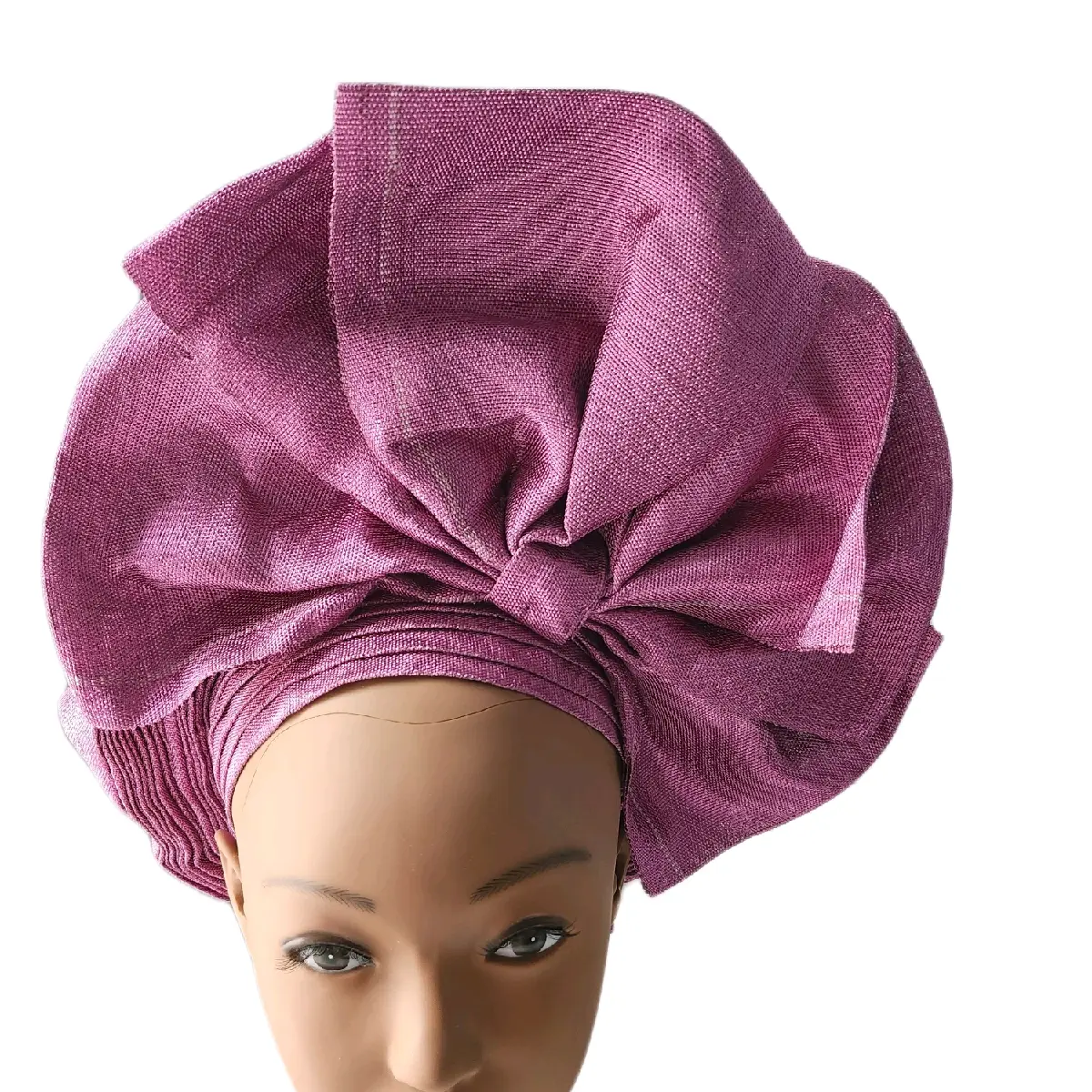 Aso-oke Autogele fabric for women in Onion color. Ready and easy to tie. The headtie is gorgeous and stunning.