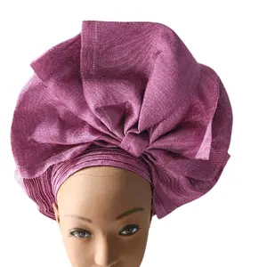Aso-oke Autogele fabric for women in Onion color. Ready and easy to tie. The headtie is gorgeous and stunning.