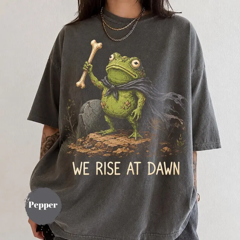 Comfort Colors We Rise At Dawn Shirt, Funny Zombie Frog Graphic Tee, Cute Summerween Apparel, Spooky Season Gift, Halloween Meme Tshirt