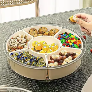 A separate serving tray with a lid and handle, a 6-section portable compartmentalized dessert box container, a covered vegetable tray that can hold fruits, vegetables, candies and nuts, suitable for use in the kitchen, parties, travel and picnics