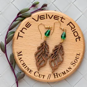 Wood Leaf Earrings with Green Beads – Laser Cut Sapele Jewelry • Lightweight Boho Dangles • Nature-Inspired Handmade Gift • Festival-Ready + Earthy Vibe • Modern Botanical Statement Style • The Velvet Riot Original • Machine Cut // Human Soul