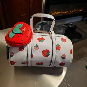 JUICY COUTURE (NEW GENIUNE) Stylish Strawberry Print Crossbody Bag with Detachable Charm and Adjustable Strap for Everyday Use