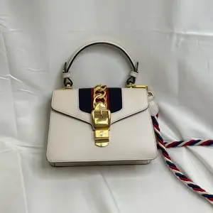 Pre-owned GUCCI leather Crossbody Bags Sylvie Mini Top Handle Crossbody Bag White