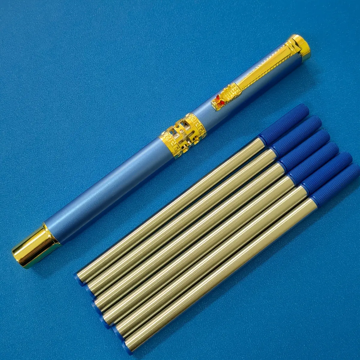 1 blue pen + 6 blue refills