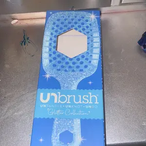 Product Review of Unbrush Detangling Hair Brush by FHI Heat from 🖤**💛