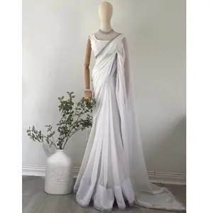 Elegant White Saree Set  Embrace grace and simplicity with this beautiful white saree set. Crafted with delicate detailing and a soft, flowing fabric, it’s perfect for weddings, festive events, or any special occasion. Radiate elegance effortlessly!