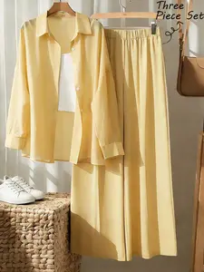 Elegant Yellow Fabric Two-Piece Outfit For Women With Long Plain Skirt And Collared Button Front Blouse Featuring Drop Shoulder Three-Quarter Length Sleeves