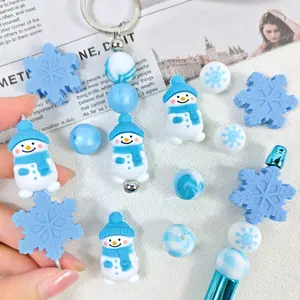56 silicone beads featuring a 3D winter snowman and snowflake theme, suitable for earrings, necklaces, bag chains, bracelets, pens, phone charms, makeup brushes, keychains, and other DIY kit accessories, perfect as Christmas and Valentine's Day gifts.