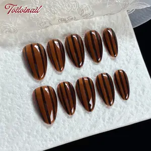 Amber Stripe Handmade Press-On Nails | Short Almond Shape, 10pcs | Warm Vintage Amber Stripe Design | Caramel Amber Base & Black Vertical Stripe & High Gloss Accents | Reusable DIY Nail Kit for Women | Trendy Nails for Spring, Summer, Dates & Daily Wear |