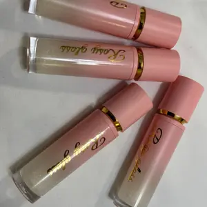 Lip Gloss - Pink Tube with Gold Accents, Shimmering Finish, Perfect for Enhancing Lips, Ideal for Daily Use
