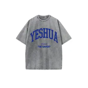 Vintage Yeshua "He Saves" Christian Sporty Chic T-Shirt - Gold Varsity Letter, Washed Black Cotton, Oversized Short Sleeve Crewneck Faith-Based Casual Tee