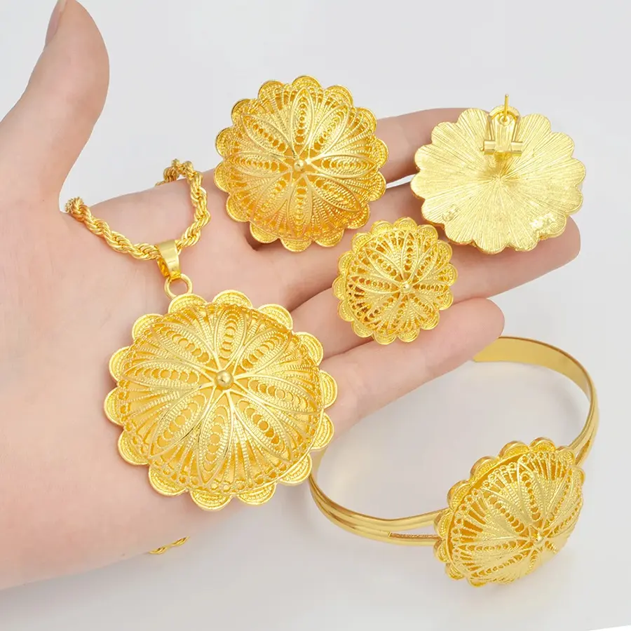 4-piece 24K Gold-plated Filigree Sunburst Pendant Jewelry Set Features An Intricate Floral Design