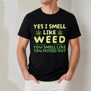 "Yes I Smell Like Weed" Graphic T-Shirt - Bold Playful Streetwear Statement Top - Green Leaf Design Aesthetic Apparel - Comfortable Short Sleeve Graphic Shirt - Unique Professional Detail Crew Neck Tee