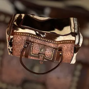 Leather and hair on hide duffle bag
