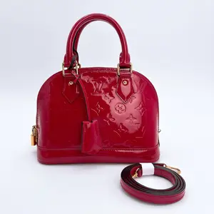 Pre-owned Louis Vuitton leather Crossbody Bags Vernis Alma BB Rose