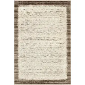 Sonali Casual Bordered Fringe Area Rug