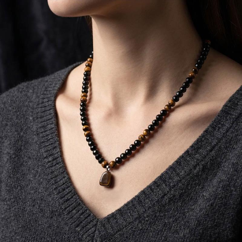 GEMRICH Prosperity necklace featuring a tiger’s eye stone pendant, crafted from healing crystals and obsidian. Suitable for anniversary celebrations, vacations, and themed parties; combines jewelry charm with abundant crystal energy—an ideal gift.