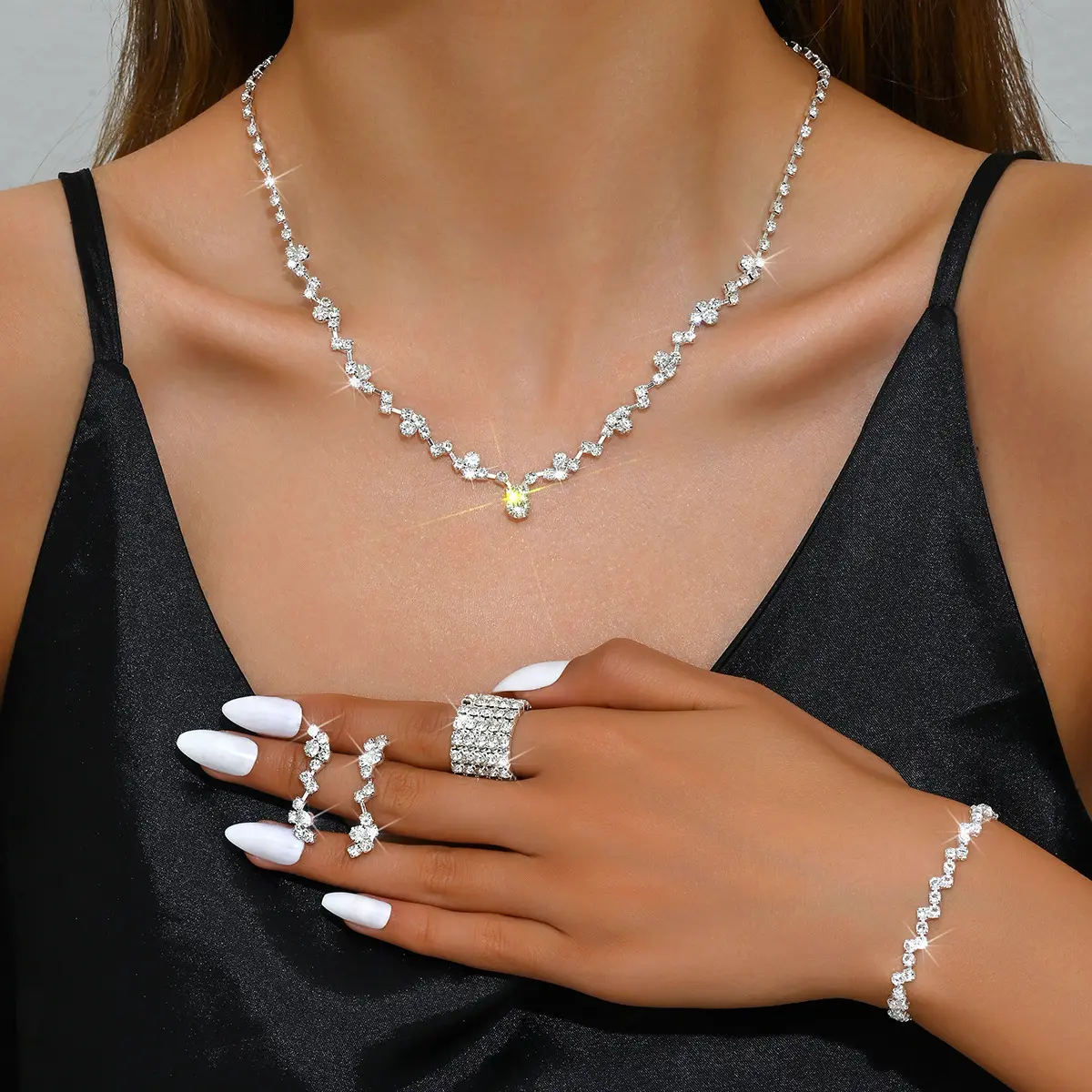 425785424 5 silver necklace earrings bra