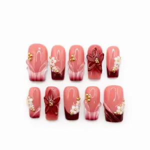 Press On Nails Crimson Petal , Medium Square, Blush Pink Base, Wine Red French Tips, 3D Floral Accents, Gold Bead Details, Glossy Finish  Prette Nail Studio