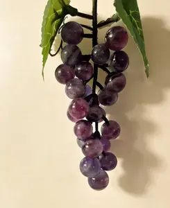 decorative item in the shape of a grape, made from purple fluorite as the raw material