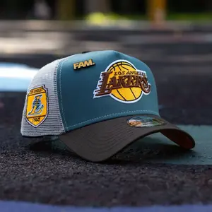 NEW ERA 9FORTY A-FRAME NBA LOS ANGELES LAKERS CHROME PINE GREEN / ORANGE UV TRUCKER